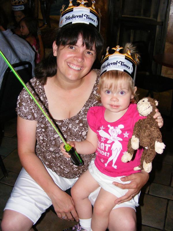 MedievalTimes (14).JPG - Yup, we have crowns, we must be a couple of Princesses.  By the way, check out the sweet Light-Sword thingy I got AND Cheeky!?...